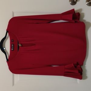 Extra Small Top, magenta color with ruffle at the cuff. 7th Avenue Design Studio